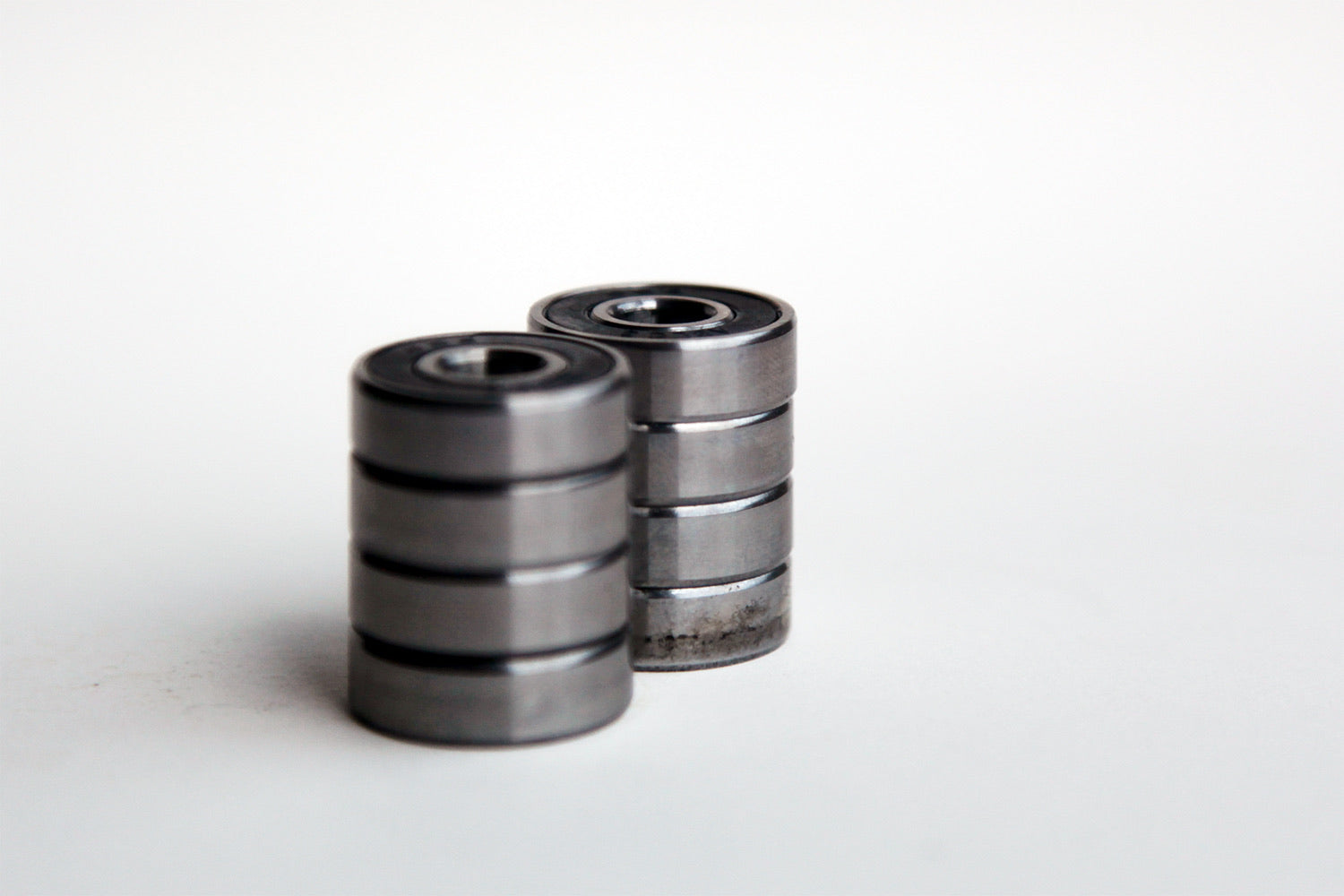 Two stacks of snakeboard wheel bearings